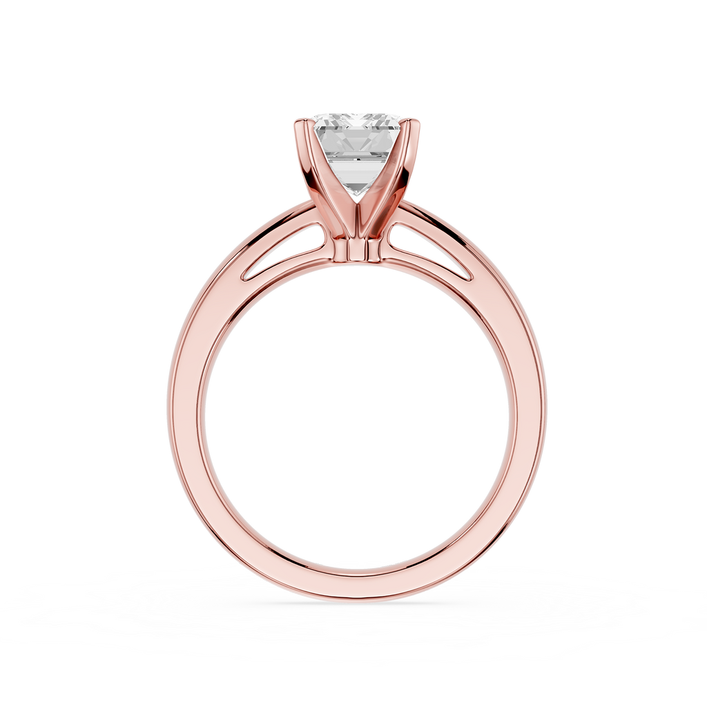 Rose gold ring with a diamond on a white background