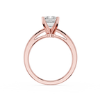 Rose gold ring with a diamond on a white background