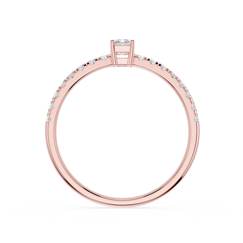 Rose gold ring with diamonds on a white background