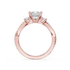 Rose gold ring with a diamond on a white background