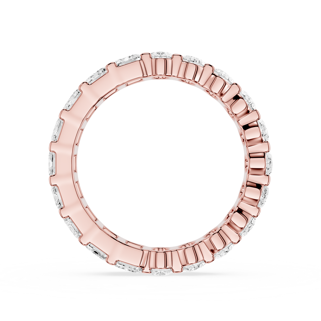 Rose gold ring with diamonds on a white background