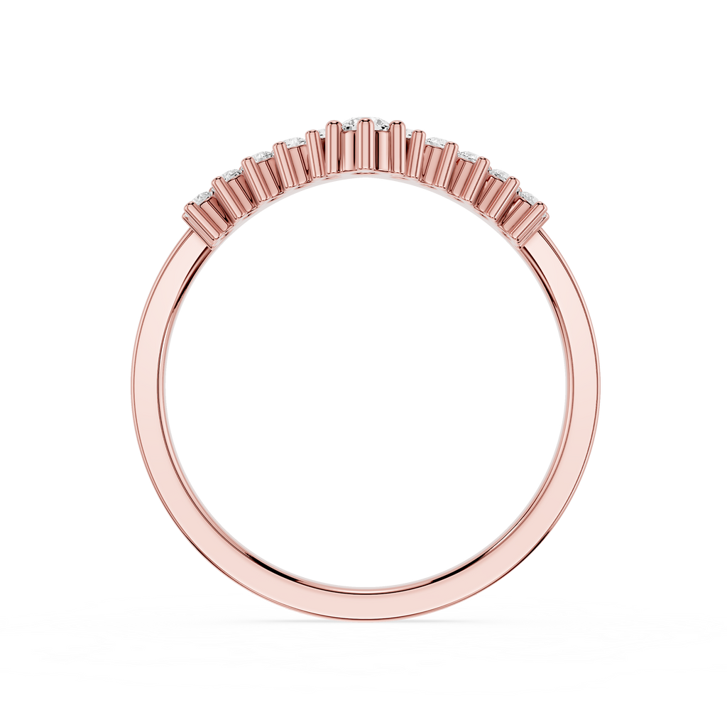 Rose gold ring with small diamonds on a white background