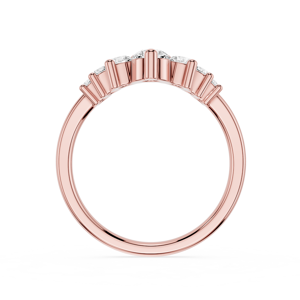 Rose gold ring with diamonds on a white background