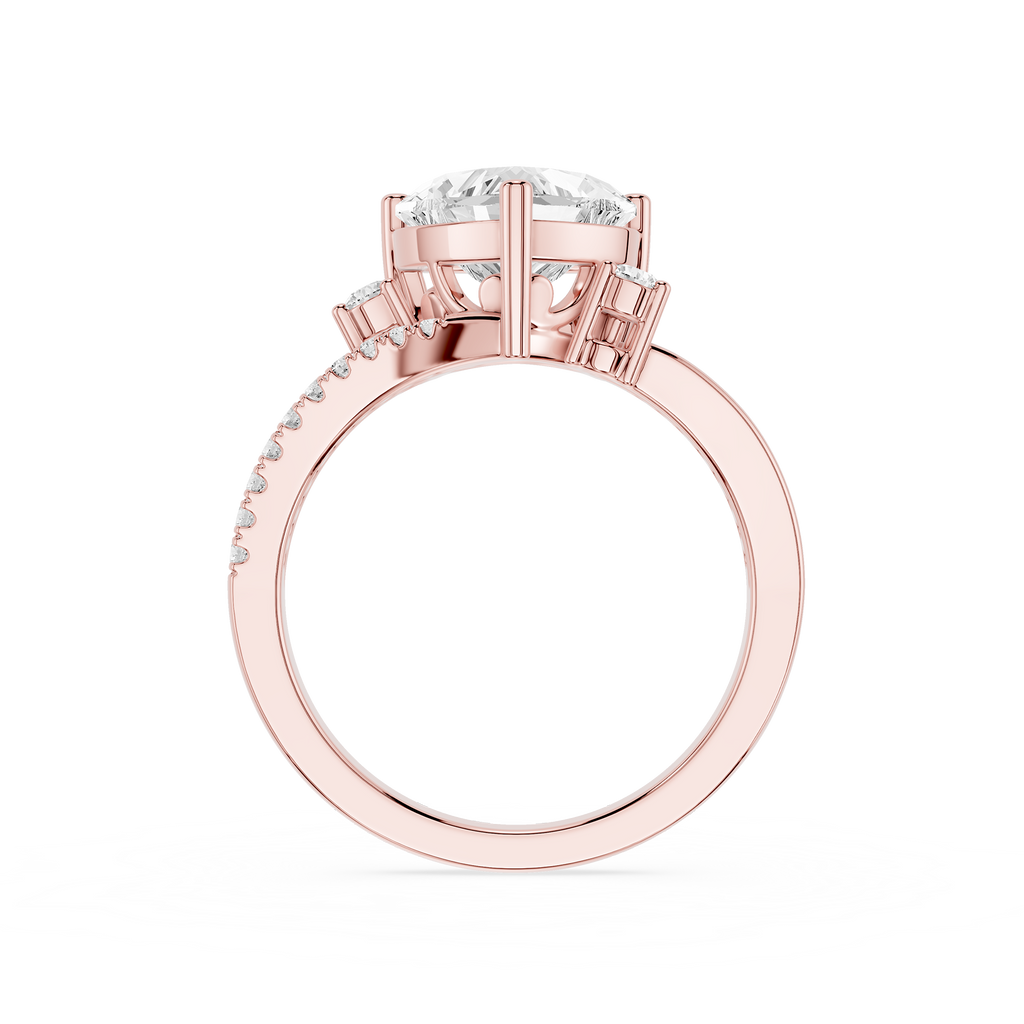 Rose gold ring with a large round-cut center stone and small pavé-set stones along the shank, shown on a plain white background.