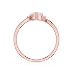 Rose gold ring with a diamond on a white background