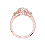 Rose gold ring with a diamond on a white background
