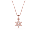 Rose gold snowflake pendant necklace on a white background