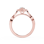 Rose gold ring with a diamond on a white background