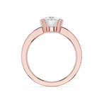 Rose gold ring with a diamond on a white background