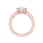 Rose gold ring with a diamond on a white background