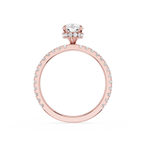 Rose gold ring with diamond accents on a white background