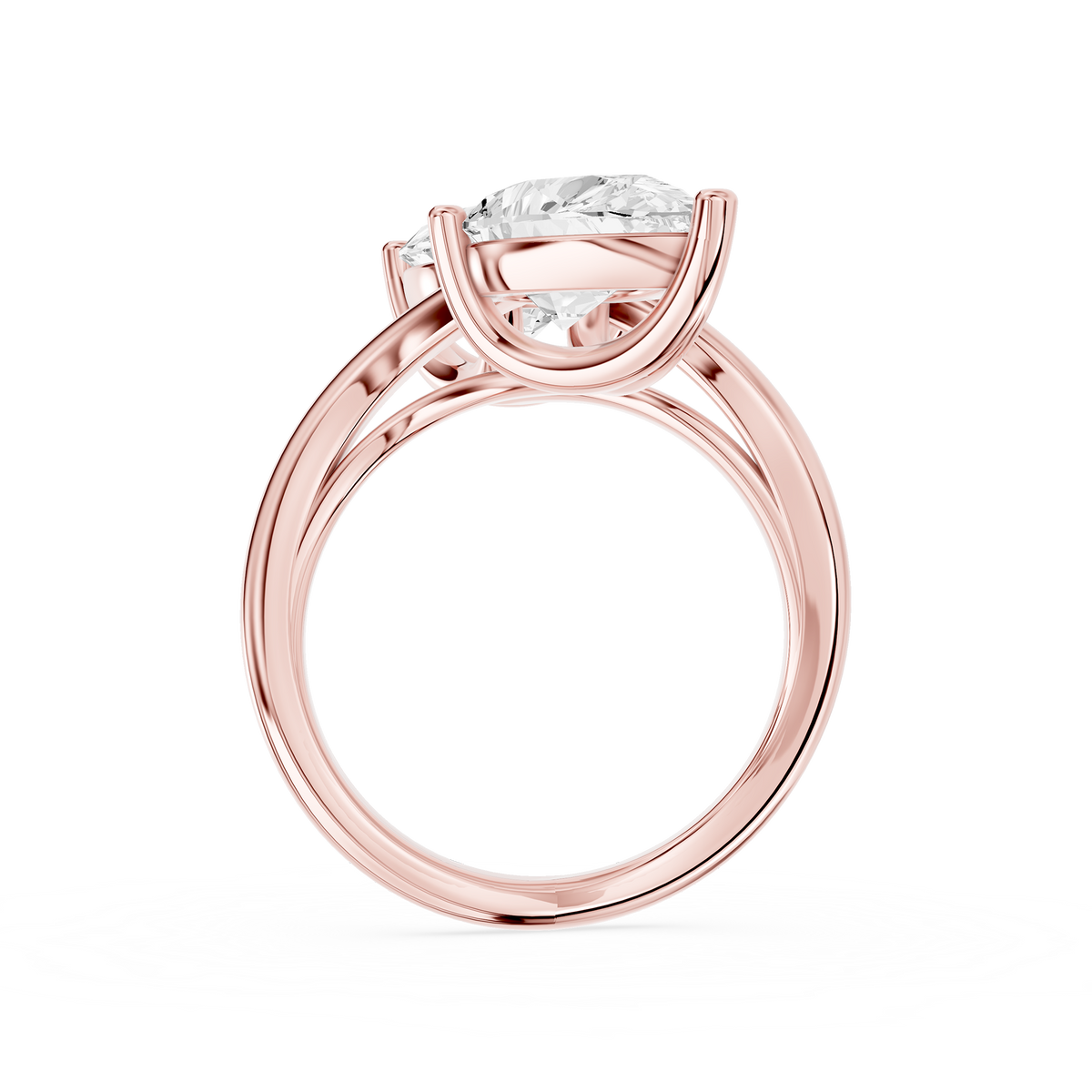 Two stone pear diamond bypass ring in rose gold showcasing opposite facing lab diamonds secured by polished prongs