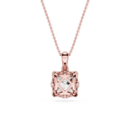 Rose gold pendant necklace on a white background