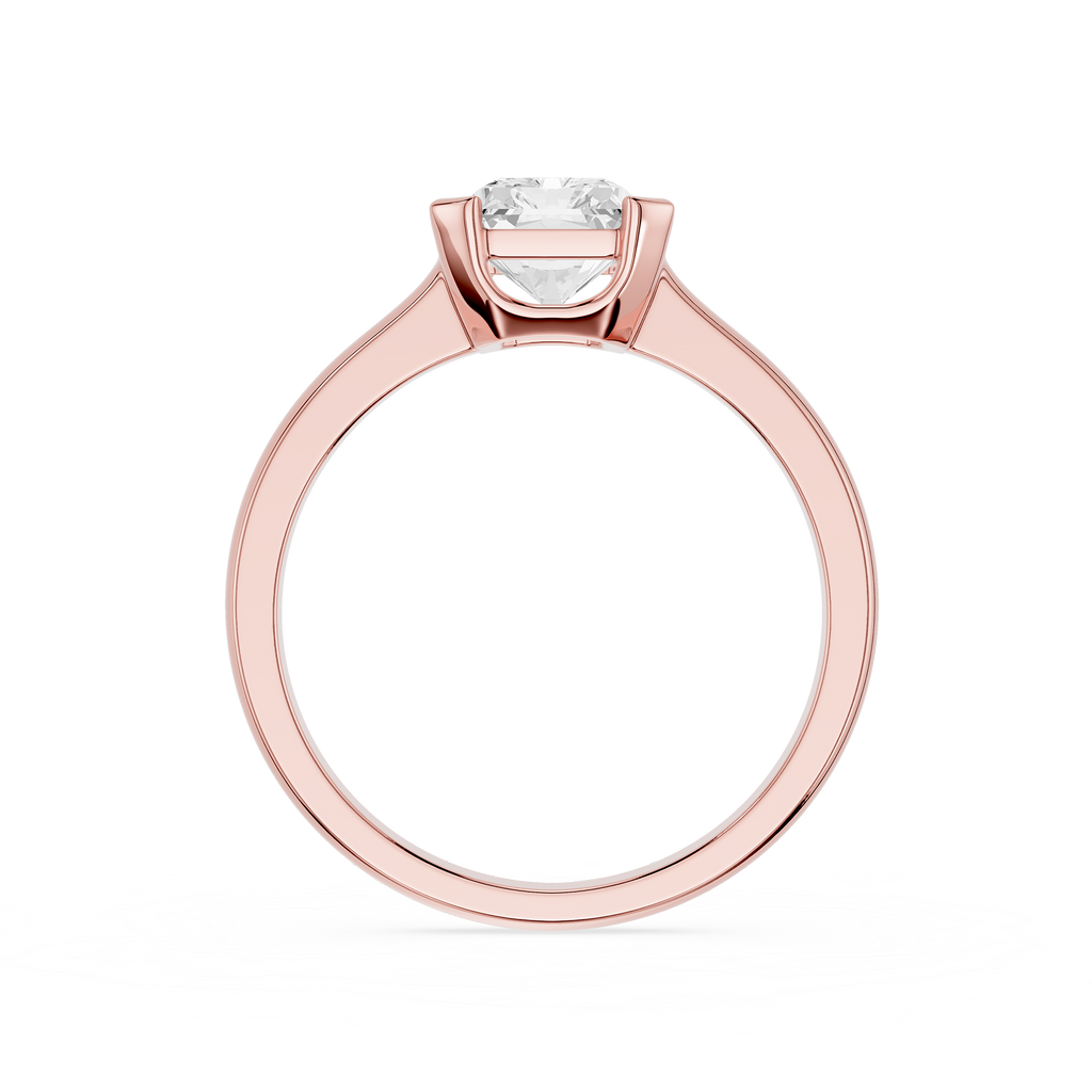 Rose gold ring with a diamond on a white background