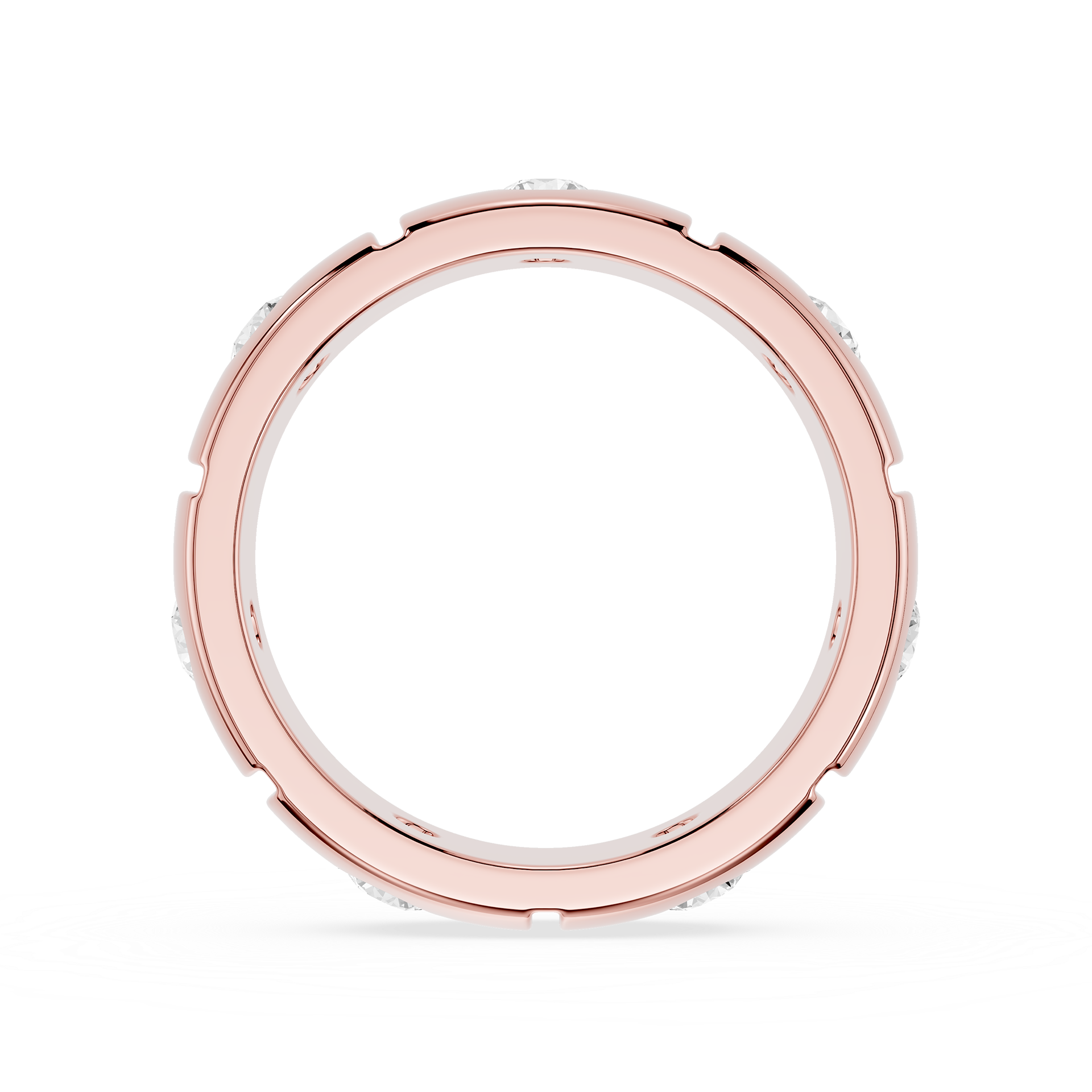 Rose gold ring with small stones on a white background