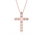 Rose gold cross necklace with clear gemstones on a white background
