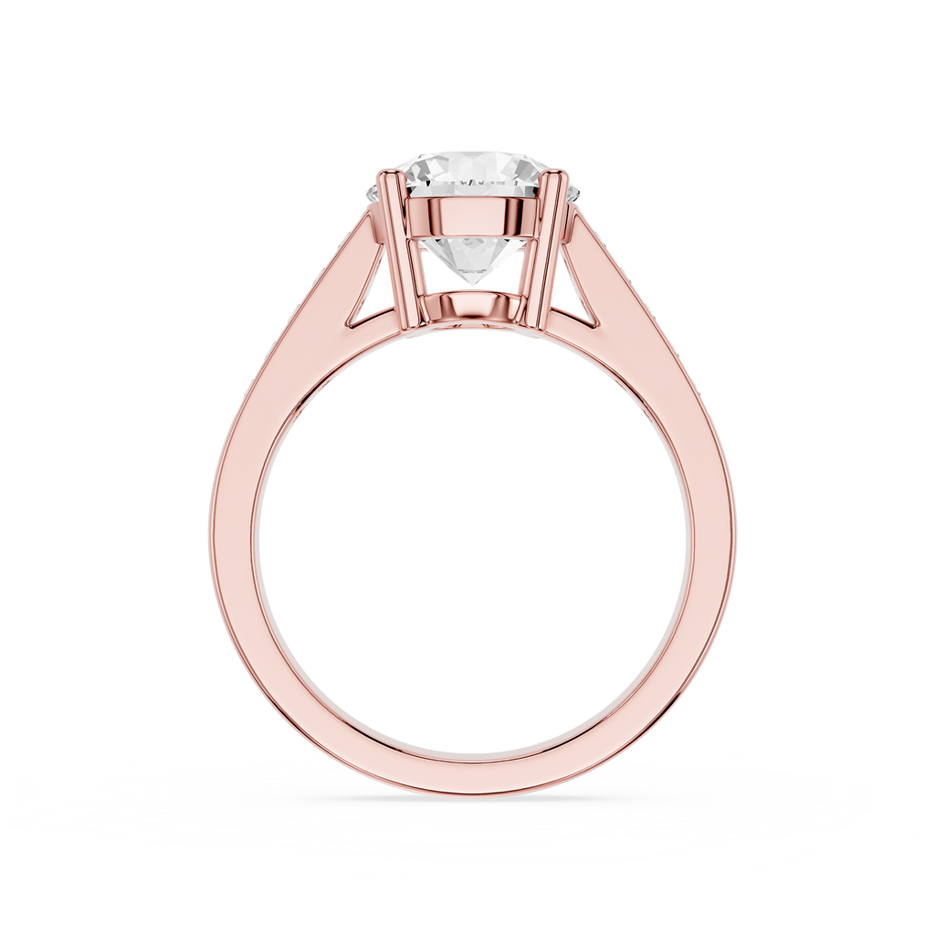 A rose gold solitaire engagement ring with a round brilliant-cut diamond center stone, shown on a clean white background.