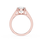 A rose gold solitaire engagement ring with a round brilliant-cut diamond center stone, shown on a clean white background.