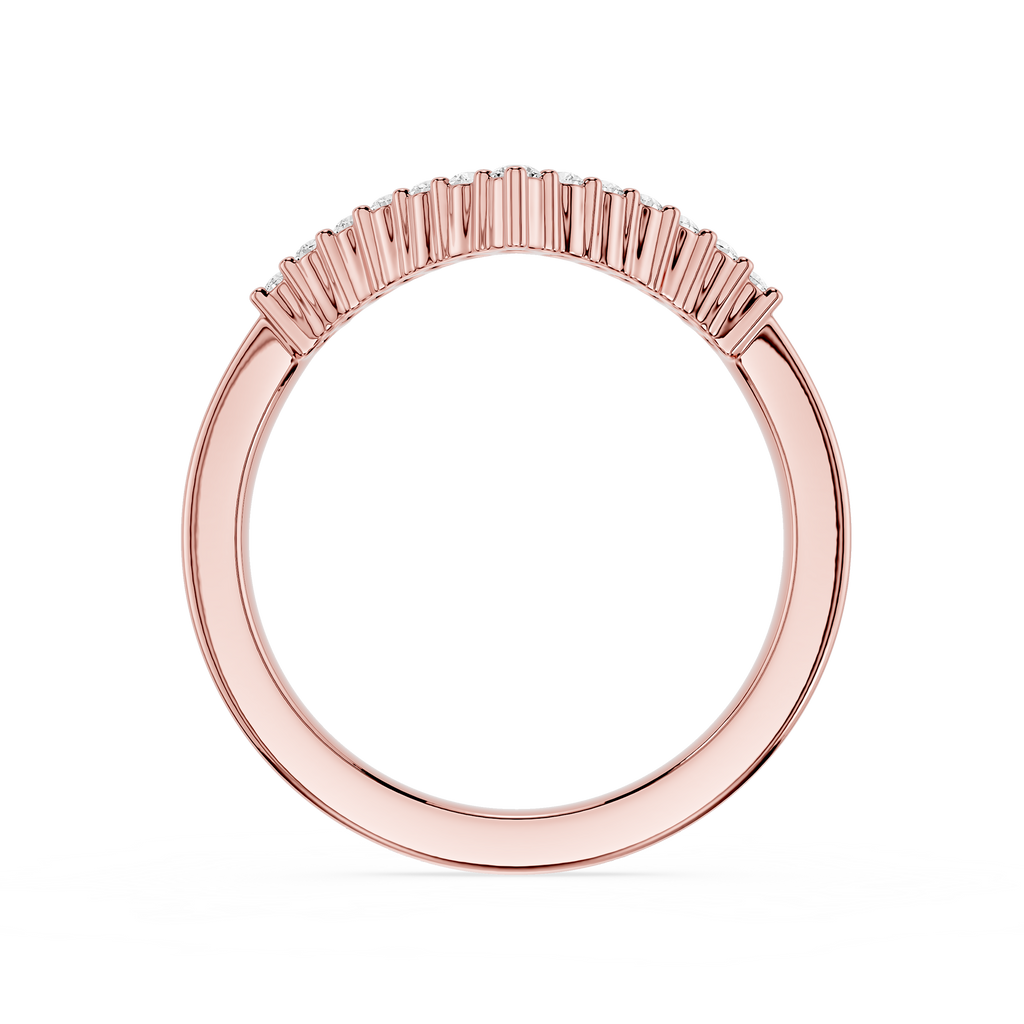 Rose gold ring with a unique design on a white background