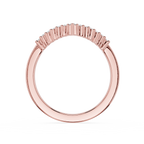 Rose gold ring with a unique design on a white background
