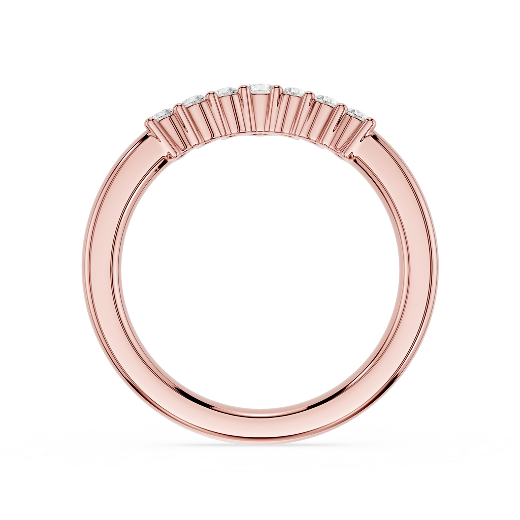 Rose gold ring with small diamonds on a white background