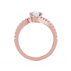 Rose gold ring with diamonds on a white background