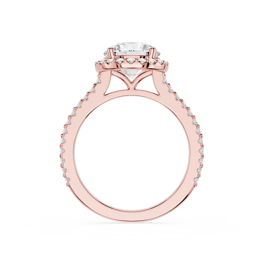 Gold ring with a diamond on a white background