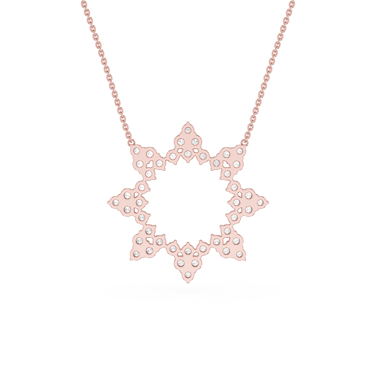 Rose gold star-shaped necklace on a white background