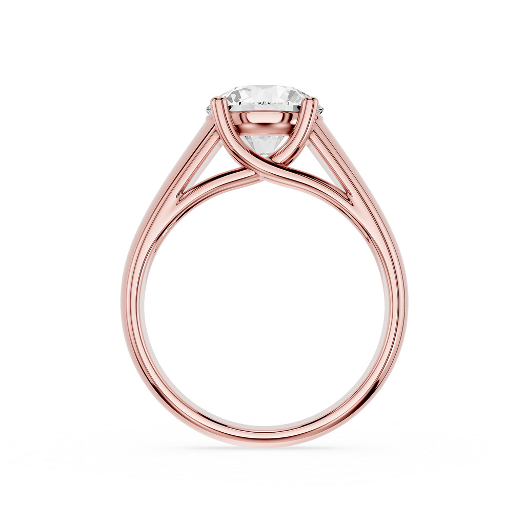 Rose gold ring with a diamond on a white background