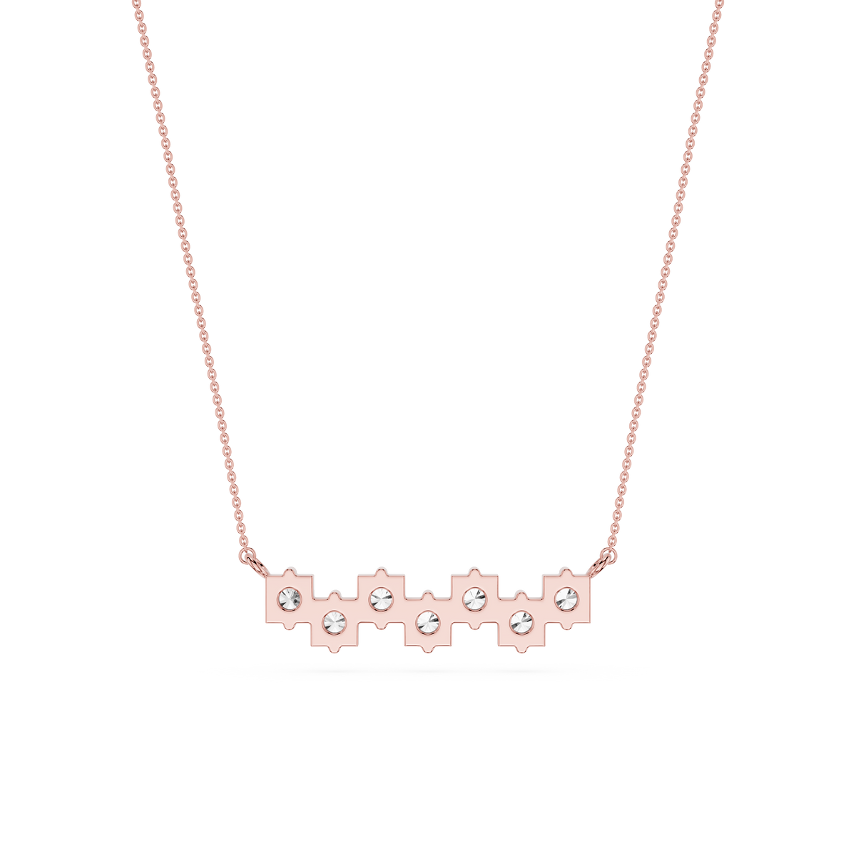 Rose gold necklace with small diamonds on a white background