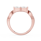Rose gold ring with a diamond on a white background