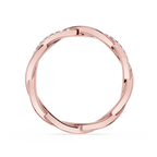 Rose gold ring with small diamonds on a white background