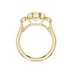 Gold ring with a diamond on a white background