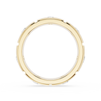 Gold ring with small diamonds on a white background
