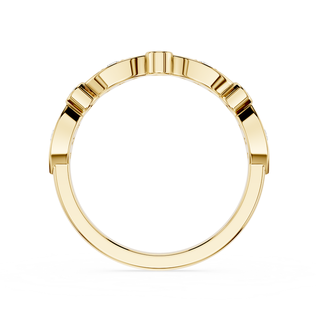 Gold ring with a geometric design on a white background