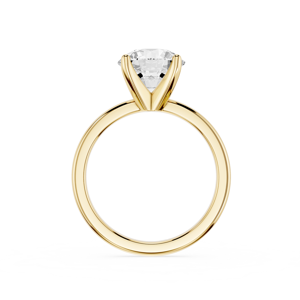 Rose gold ring with a clear gemstone on a white background