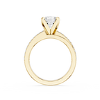 Gold ring with a diamond on a white background