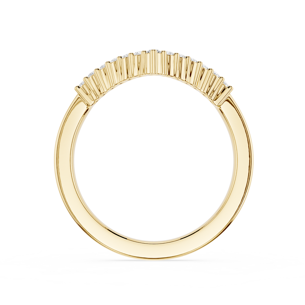 Gold ring with a unique design on a white background