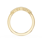 Gold ring with a unique design on a white background