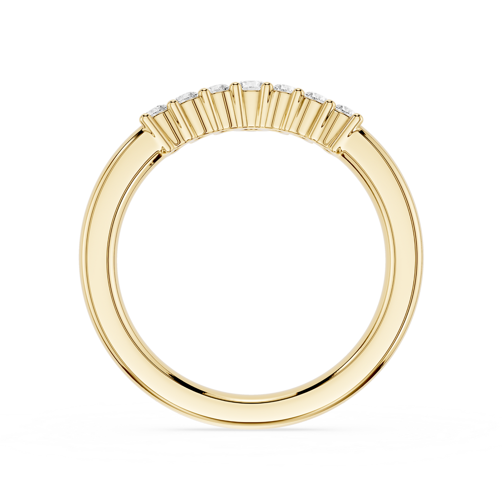 Gold ring with a baguette cut diamond setting on a white background