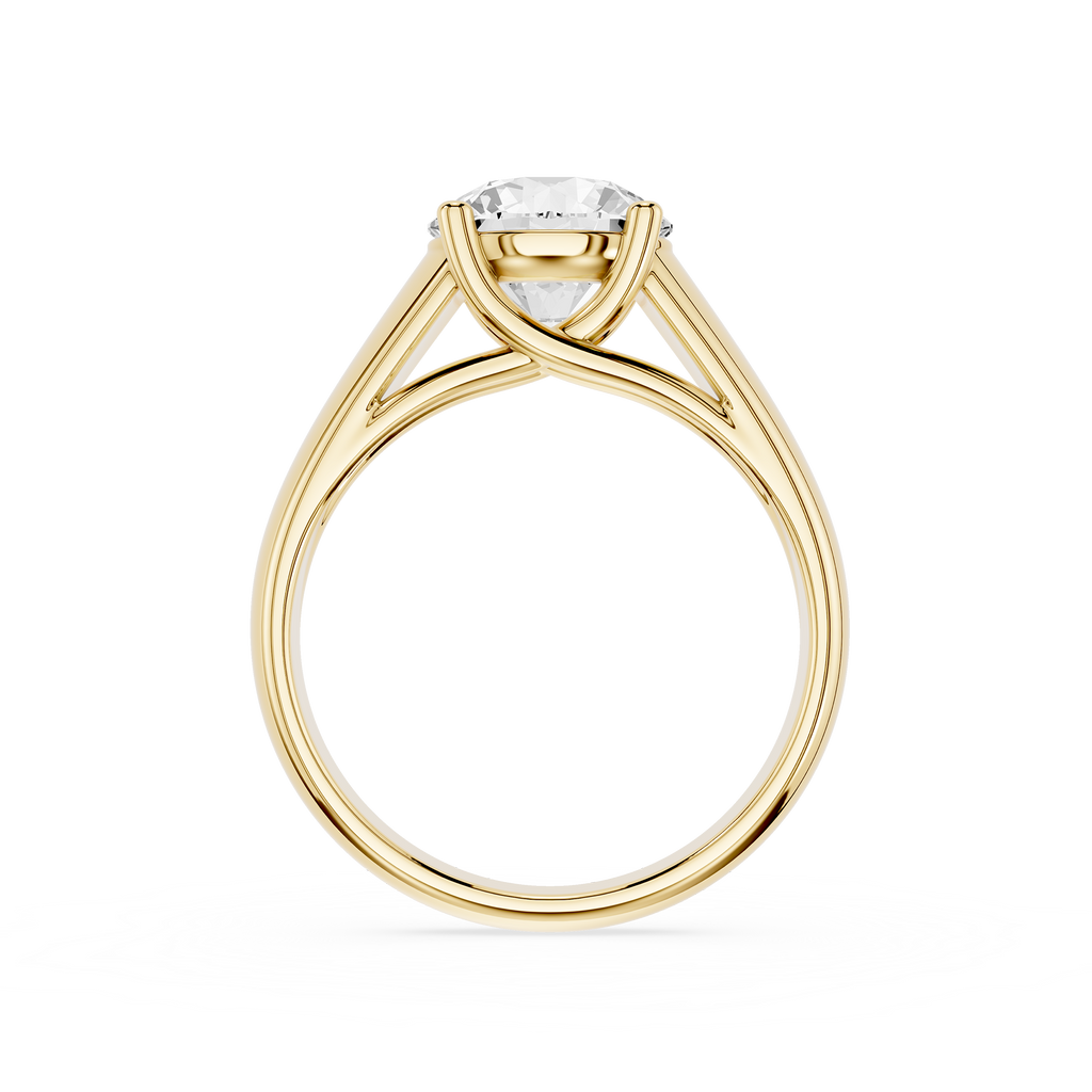 Gold ring with a diamond on a white background