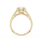 Gold ring with a diamond on a white background