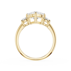 Gold ring with diamond accents on a white background