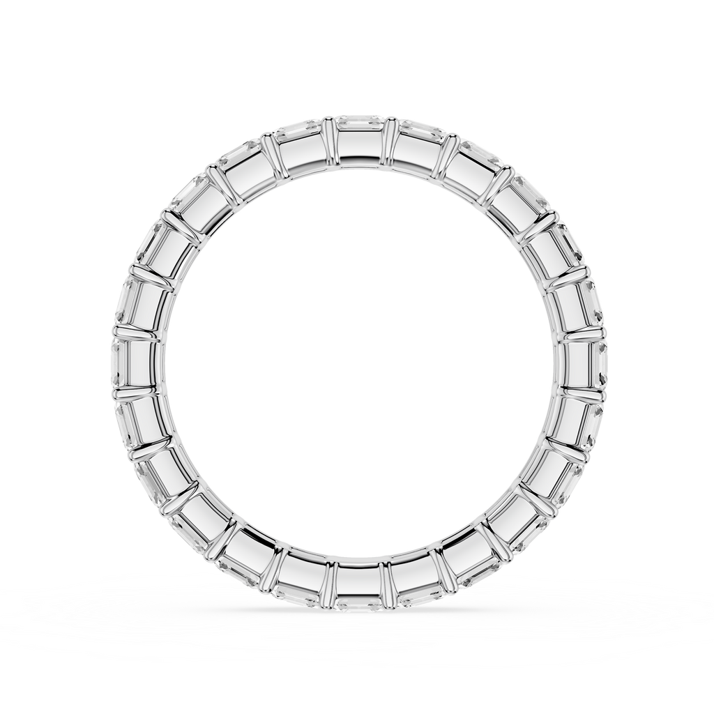 Silver ring with engraved design on a white background