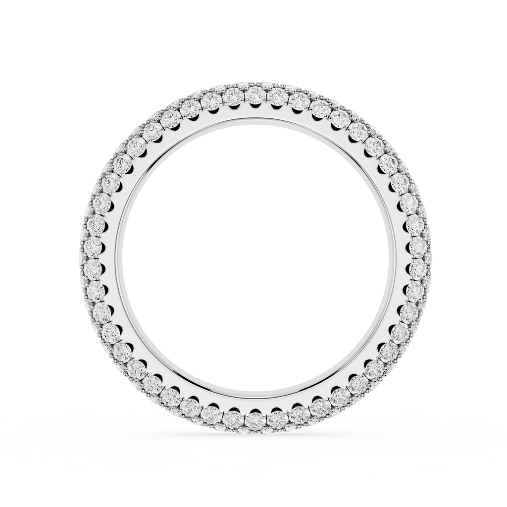 Silver ring with engraved design on a white background