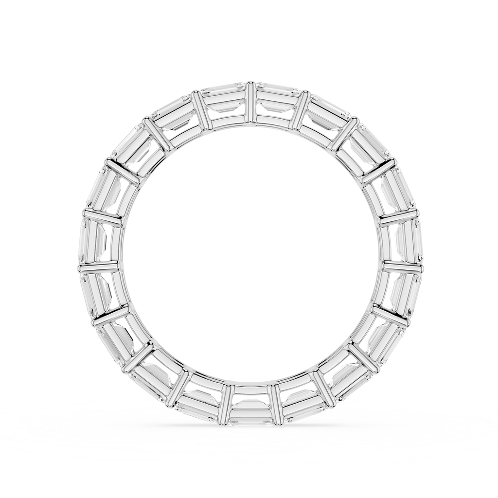 Silver ring with baguette-cut diamonds on a white background