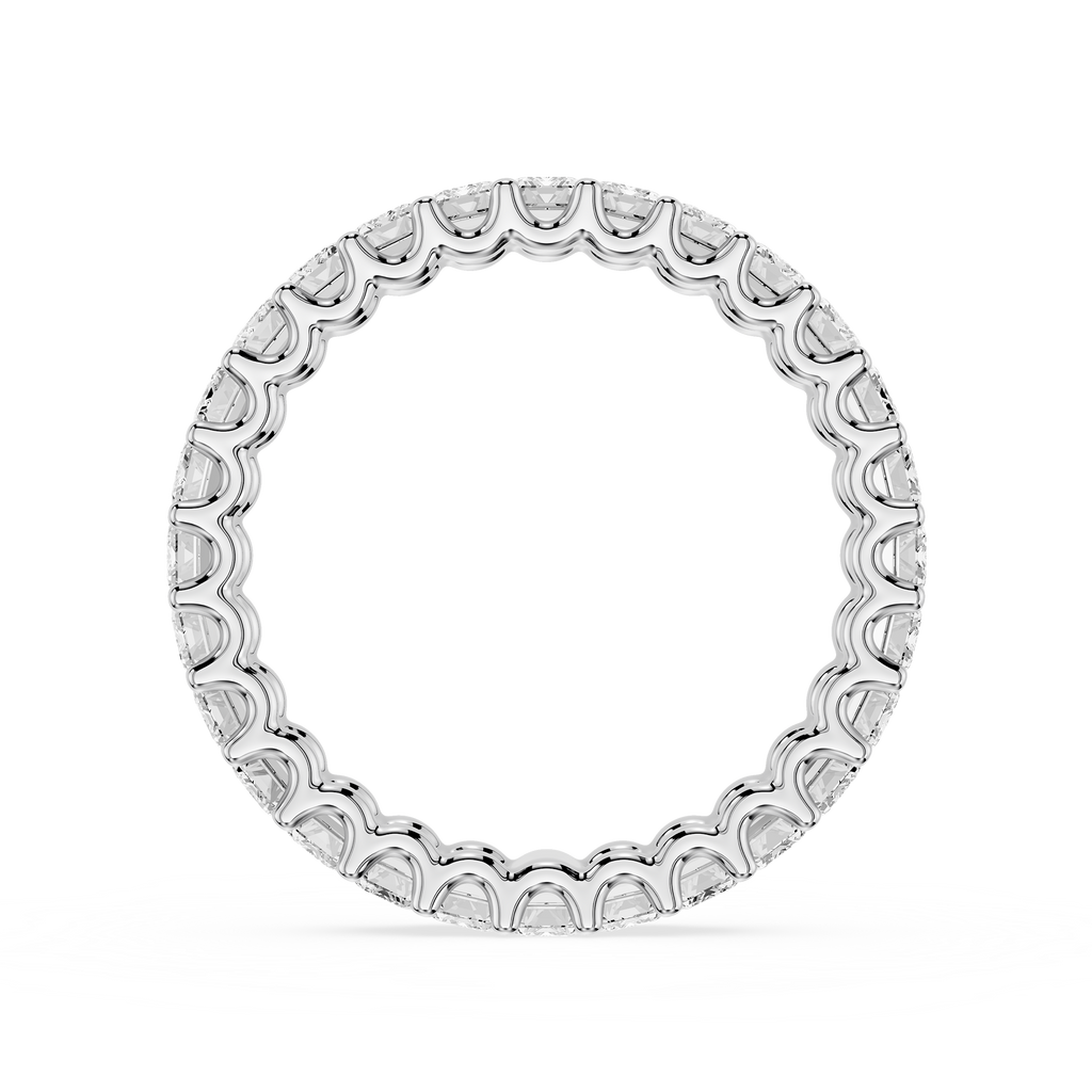 Silver ring with engraved design on a white background