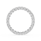 Silver ring with engraved design on a white background