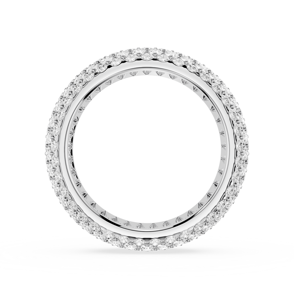 Silver ring with engraved design on a white background
