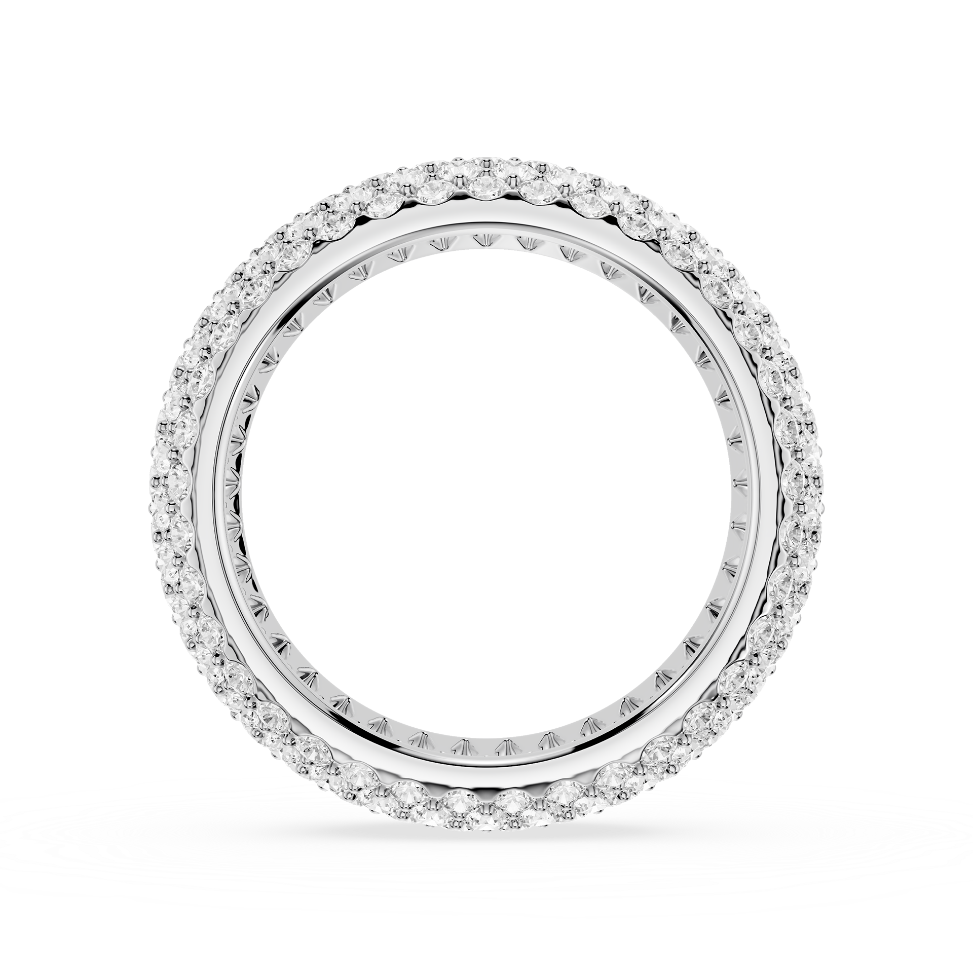 Silver ring with engraved design on a white background